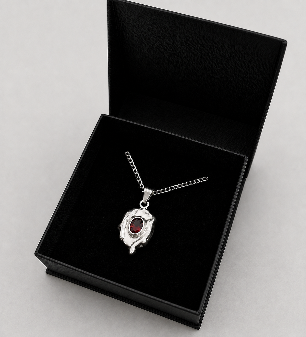 14. Dripping Garnet Pendant