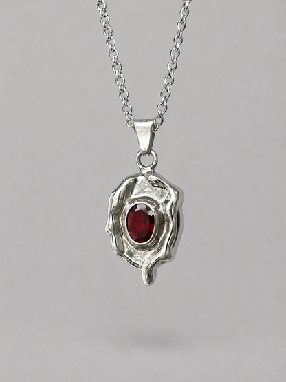 14. Dripping Garnet Pendant
