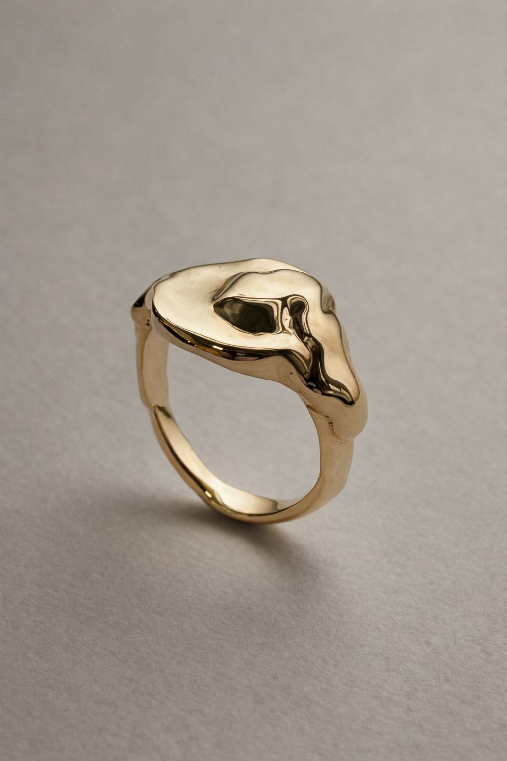 04.  Molten Gold Signet Ring