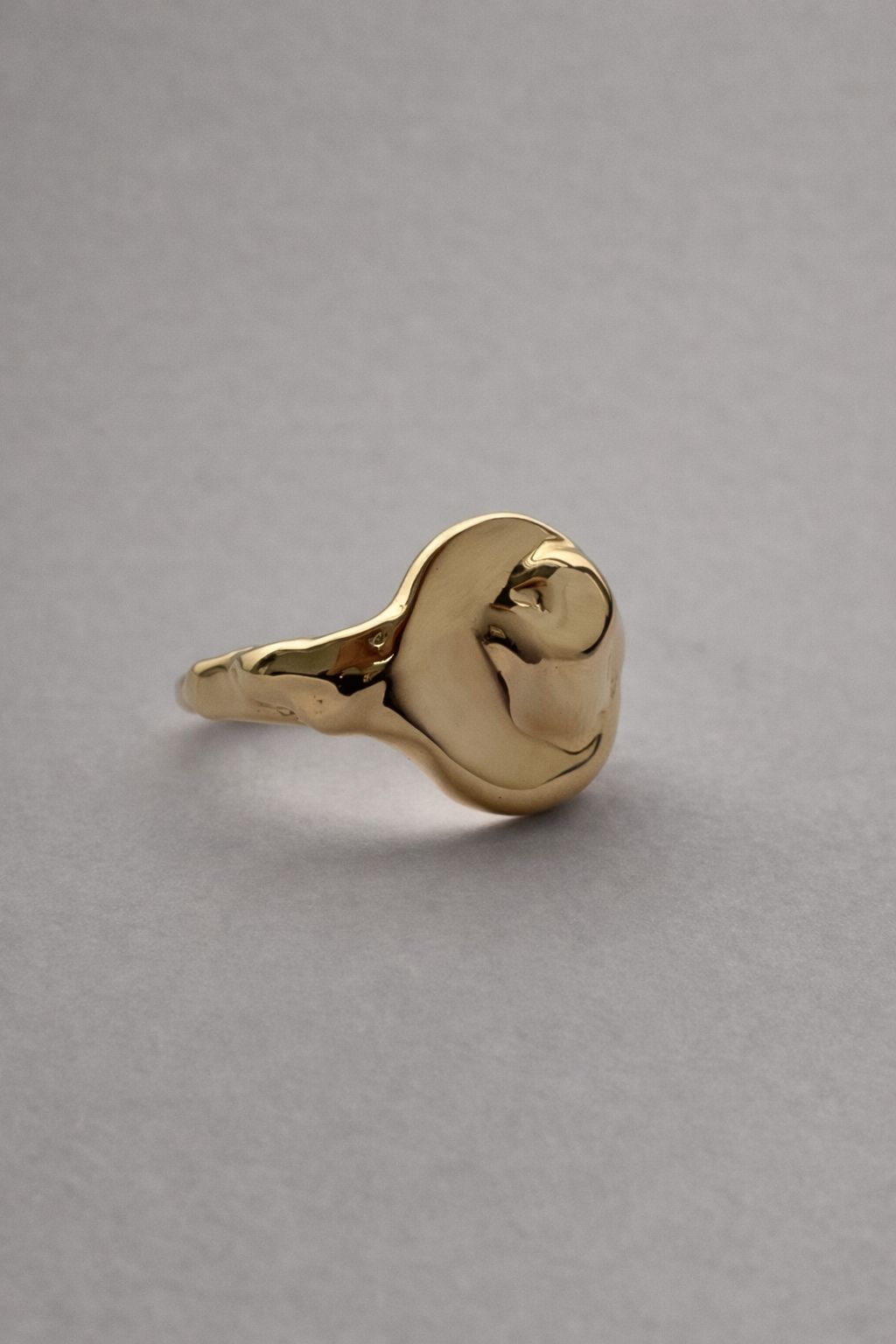 04.  Molten Gold Signet Ring