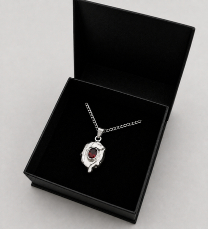 14. Dripping Garnet Pendant